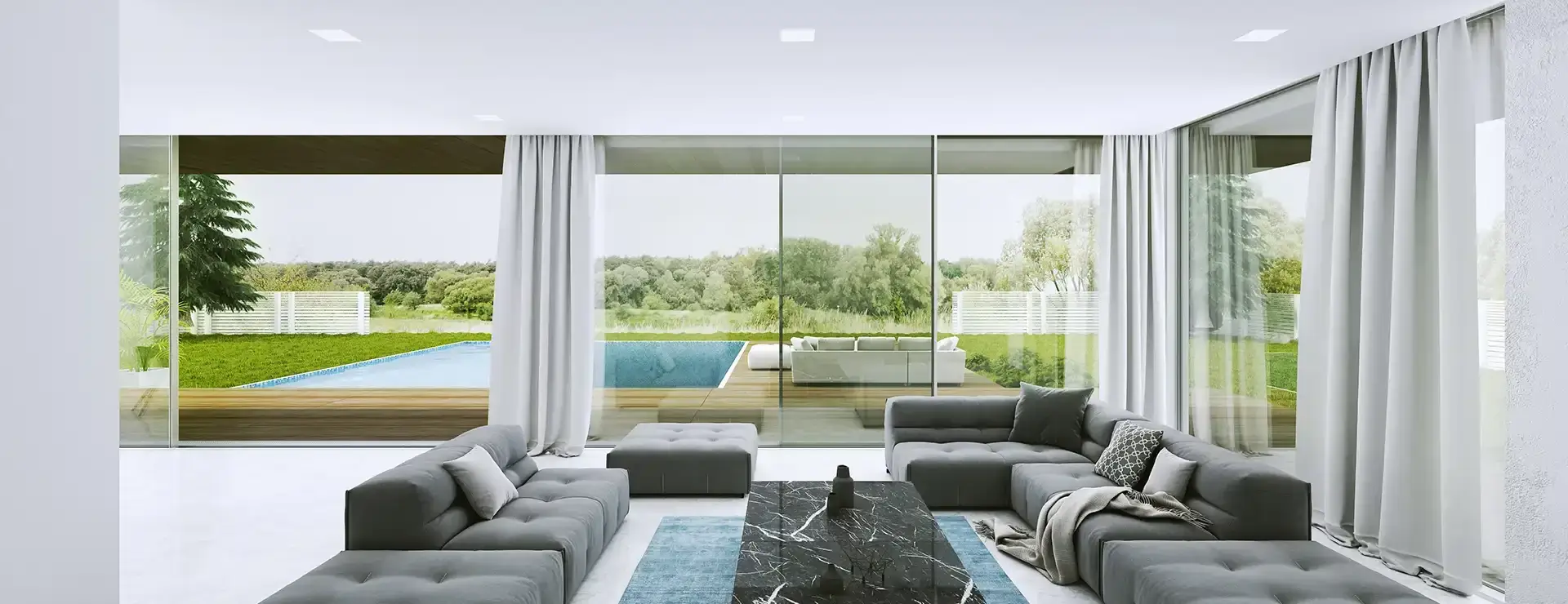 Jak zvětšit prostor obývacího pokoje? Optické propojení domu se zahradou