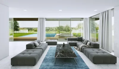 How can you enlarge the space in the living room? Optically combining the house with the garden