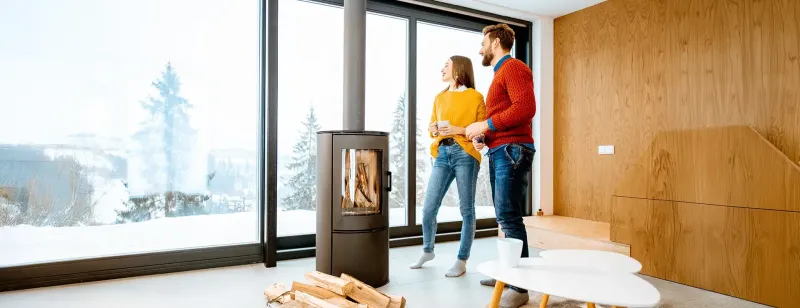 How can you save on heating costs in winter?