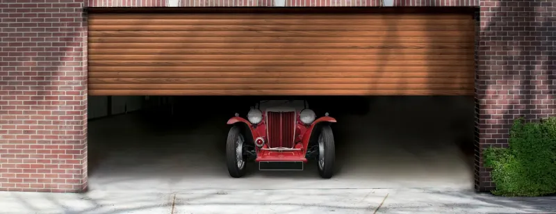 Metal garage door: aluminum or steel?
